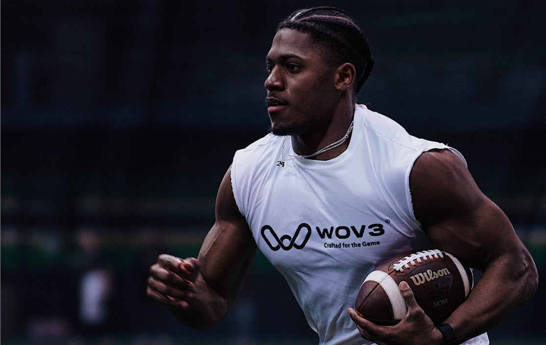 Wov3 athlete training in an original Wov3 shirt